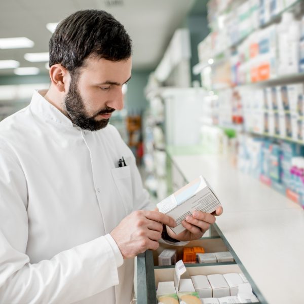 Pharmacist working in the pharmacy store